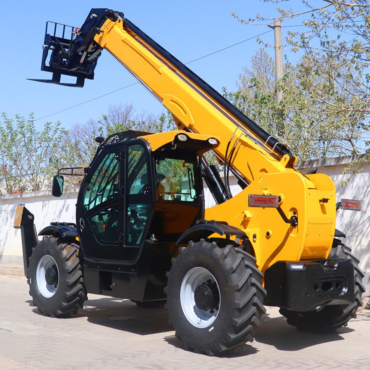 All Terrain Telehandler for Construction and Agricultural Material Transfer, Telescopic Reach Forklift with Enclosed Cab for Warehouse Yard Operations