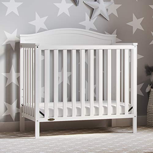 Graco Stella 4-in-1 Convertible Mini Crib (White) – GREENGUARD Gold Certified, Converts to Daybed and Twin-Size Bed, Includes Bonus 2.75-inch Mini Crib Mattress, Mini Crib with Mattress Included